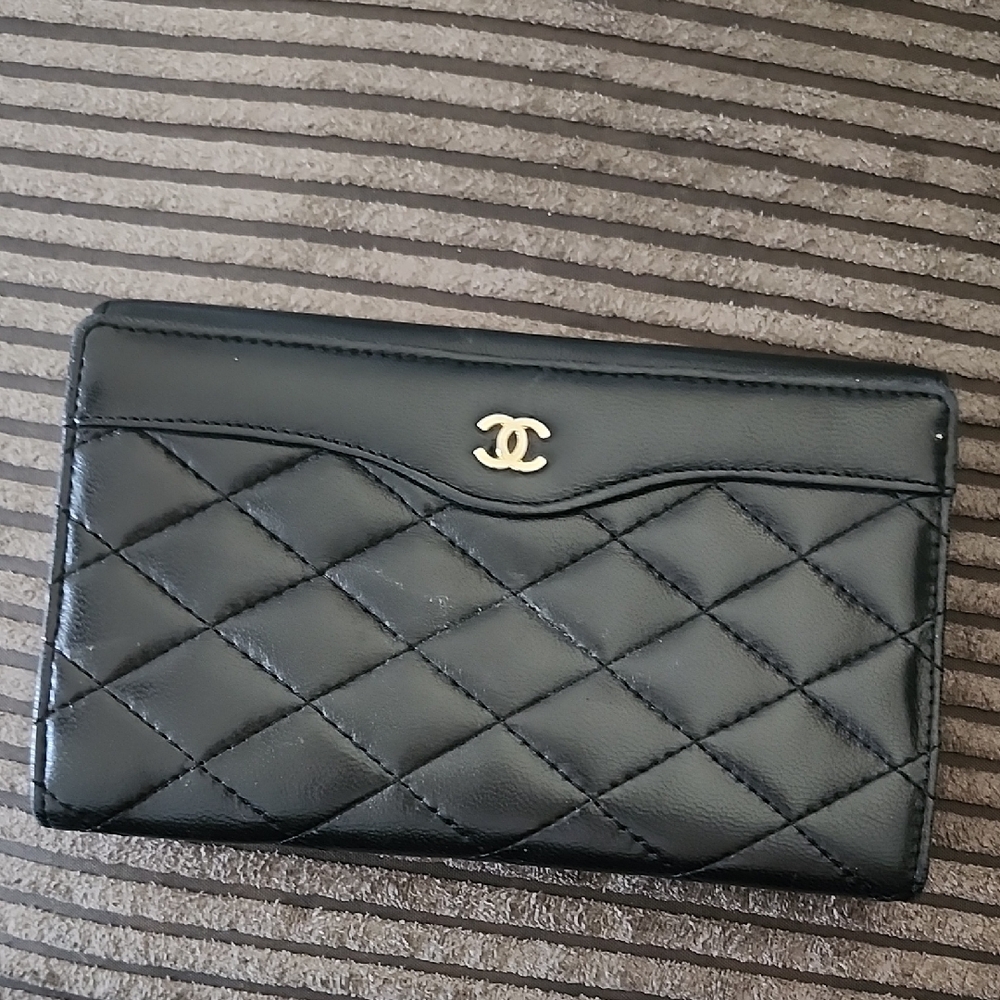 CHANEL Black Quilted Wallet with Gold Logo